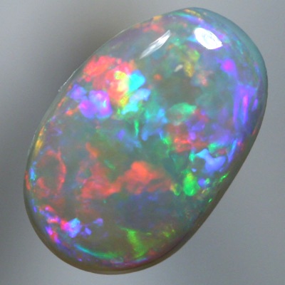 SOLID SEMI BLACK OPAL Rainbow of magenta, crisp red, green and violet